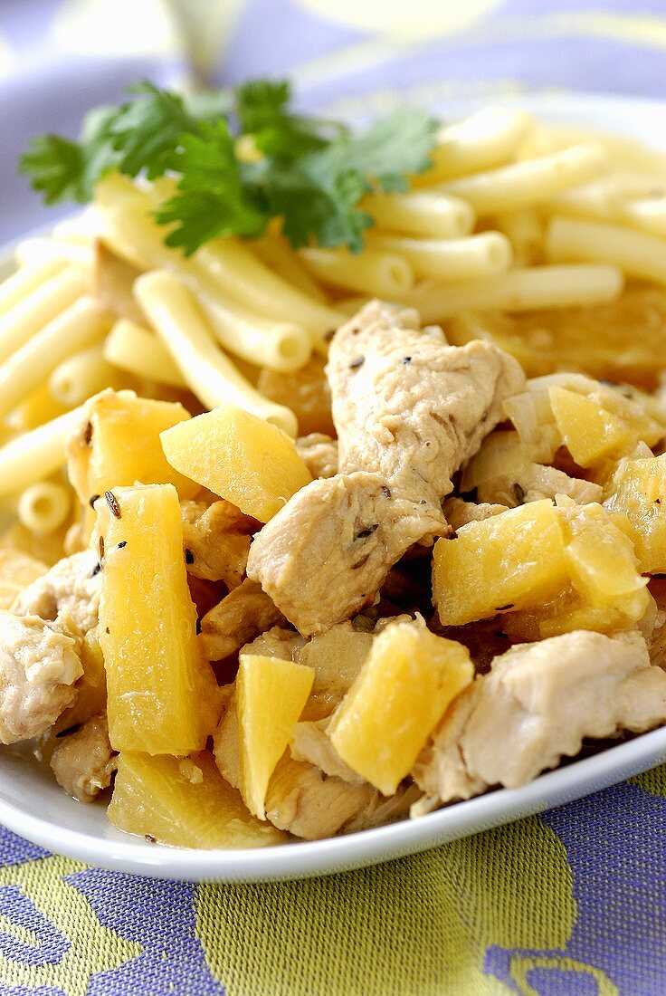 Chicken with pineapple, coconut and noodles