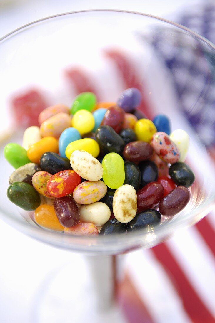 Coloured jelly beans in a glass