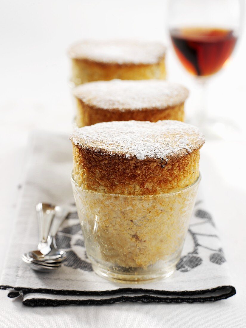 Plum soufflé in glass dishes