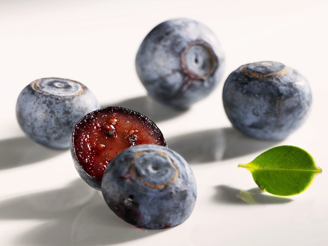 Fresh blueberries, whole and halved