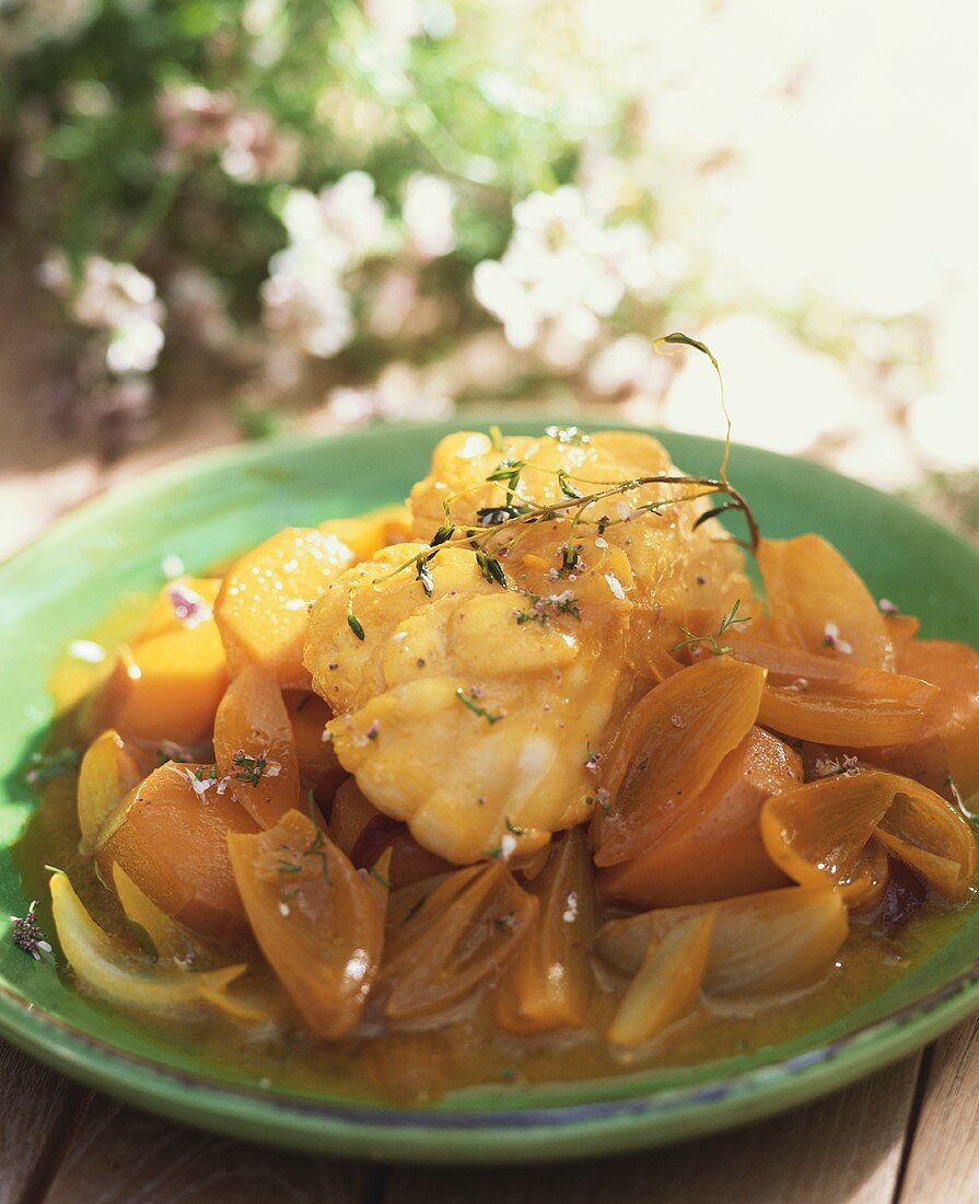 Monkfish on sweet potatoes and shallots