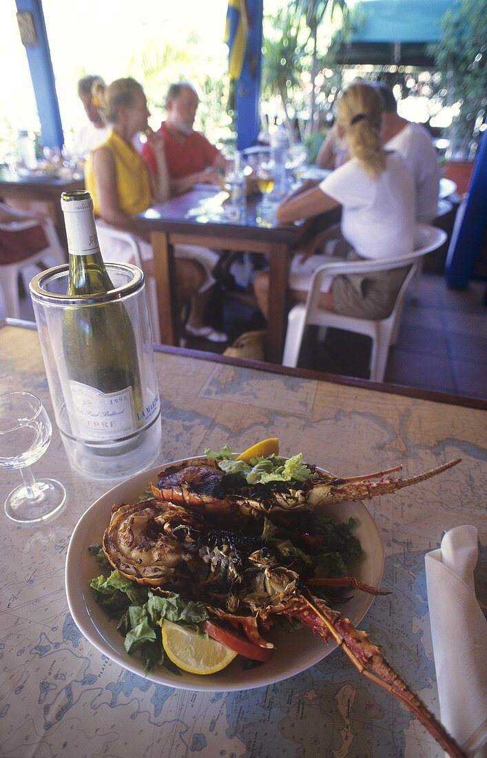 Fried spiny lobster with wine in a hotel (Caribbean)