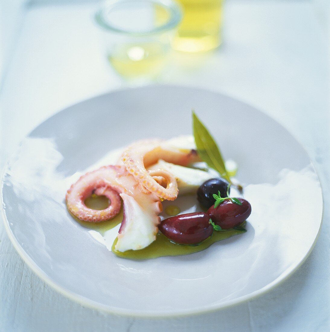 Marinated octopus arms with olives