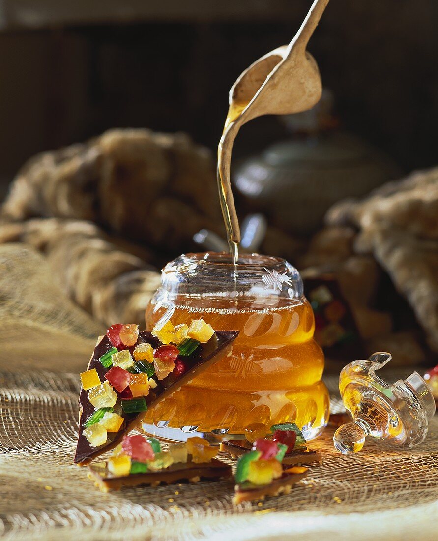 A jar of honey and chocolate caramel
