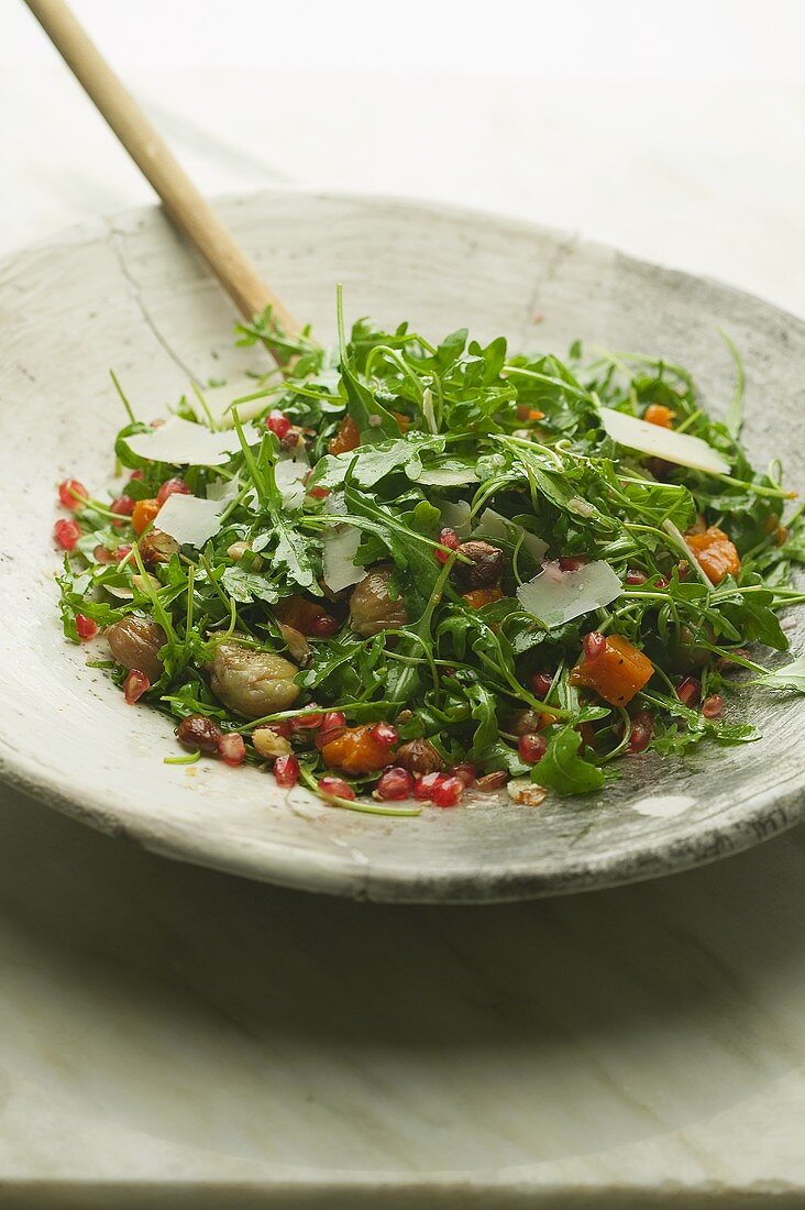 Rocket salad with chestnuts and pomegranate seeds