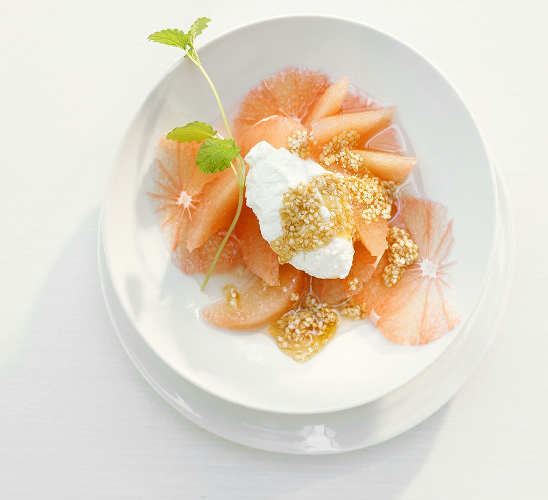 Grapefruit with cottage cheese and honey with sesame seeds