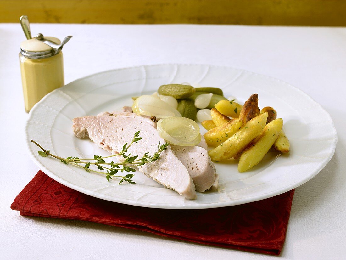 Cooked pork with gherkins and potato noodles