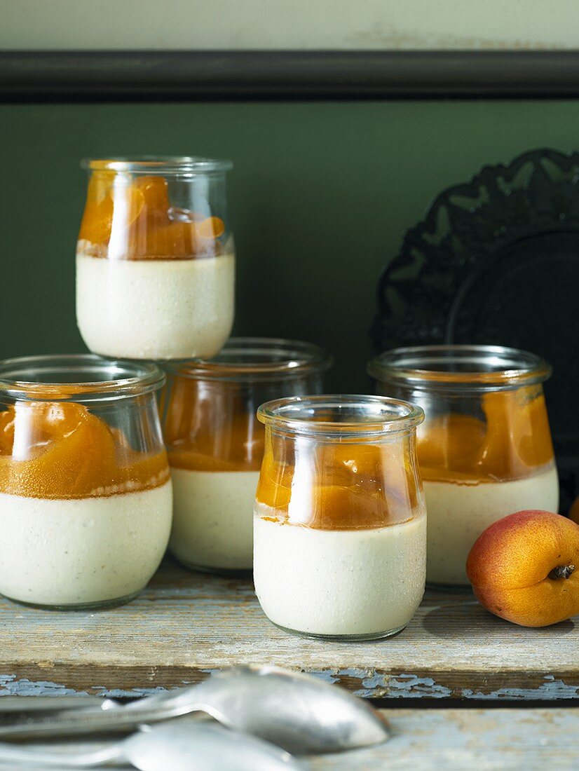 Panna cotta with apricot compote in glasses