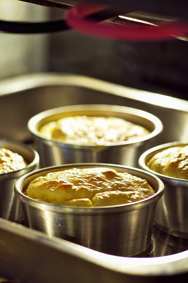 Cheese soufflés in the oven