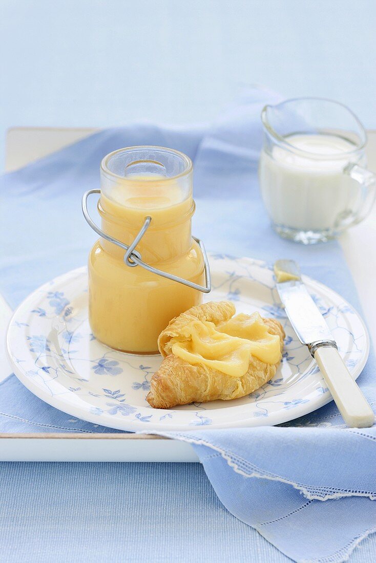 A croissant with lemon curd