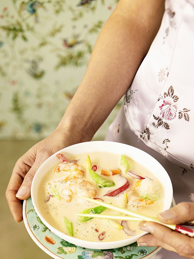 Coconut soup with ginger prawns