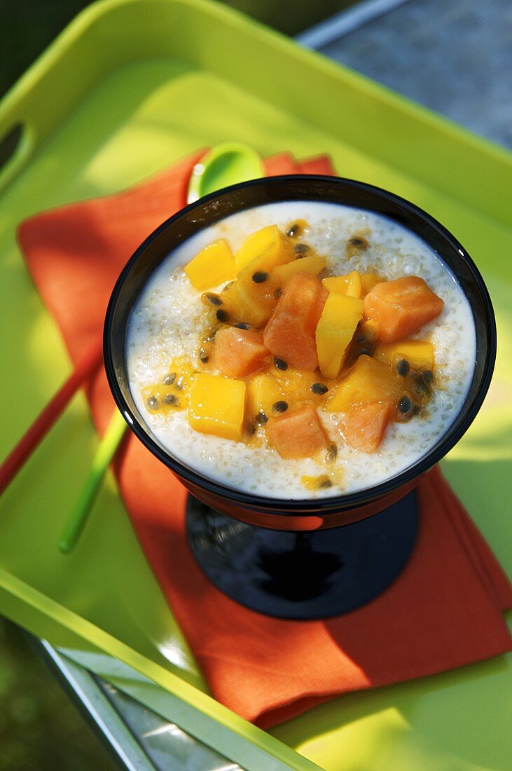 Quinoa porridge with papaya and passion fruit
