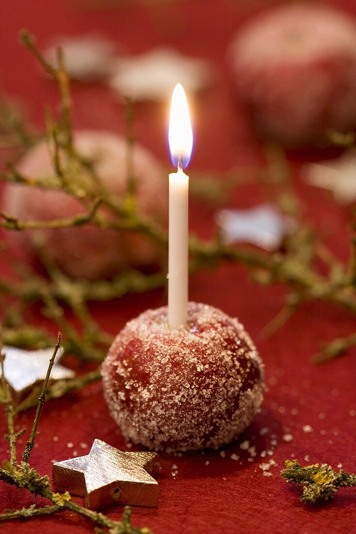 Sugared apple used as candle holder