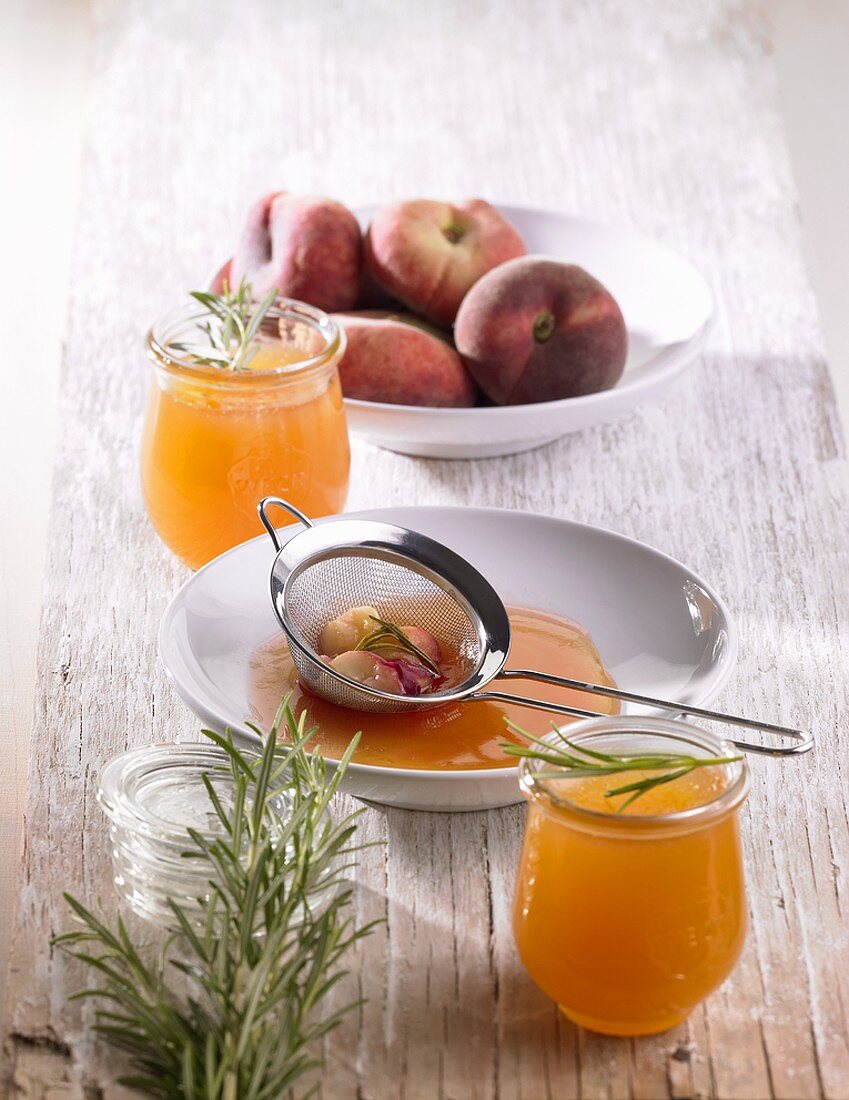 Still life with peach and rosemary jelly