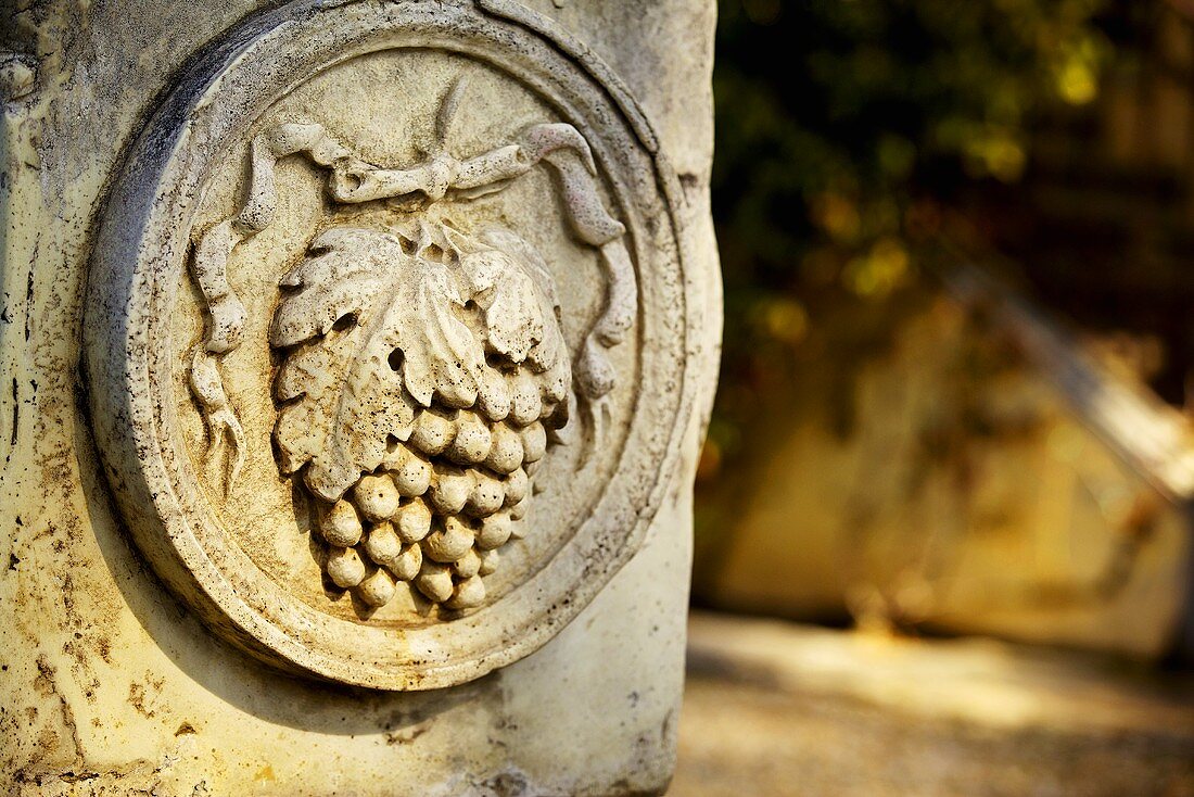 A stone relief in a Tuscany garden