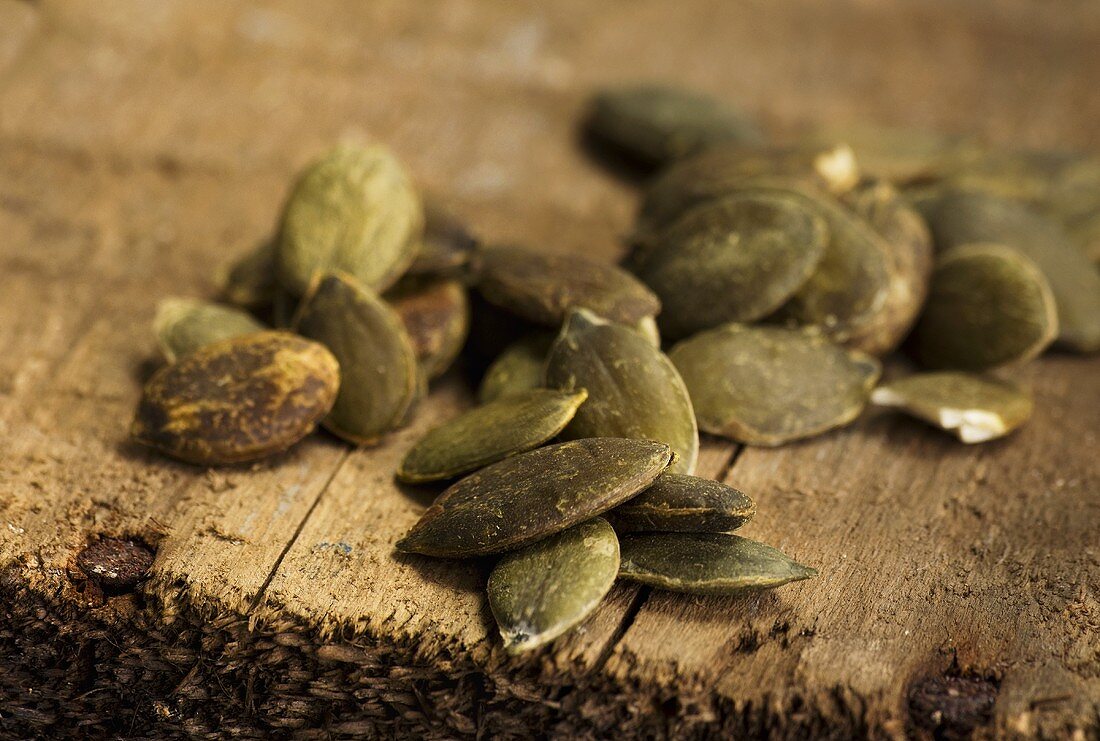 Pumpkin seeds on a wooden board