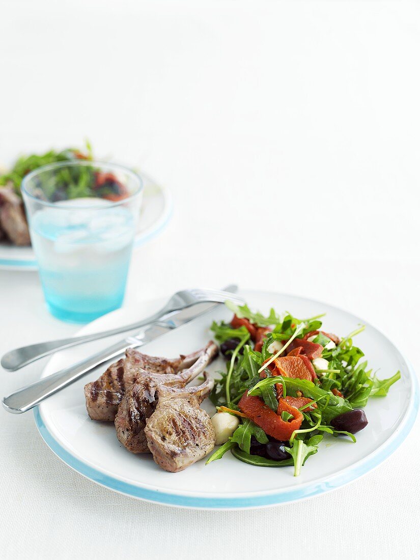 Grilled lamb cutlets with rocket salad