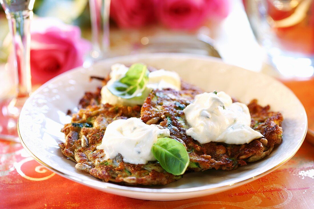 Cereal and vegetable rosti with sour cream