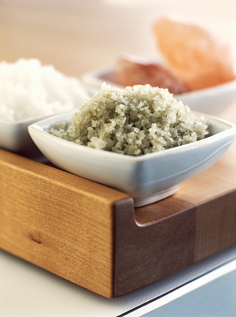 Various types of salt in small bowls