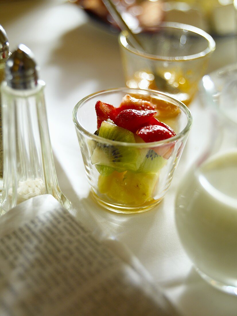 Fruit salad in glass for breakfast