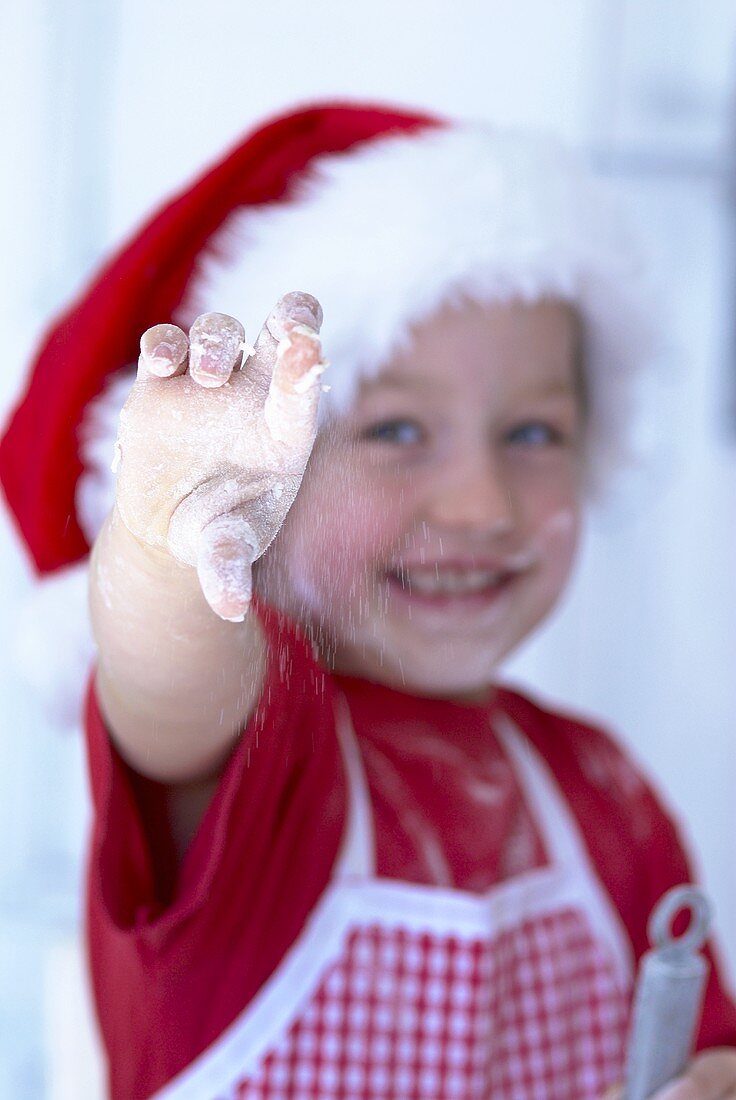 'Junge Bäckerin' mit mehlingen Händen