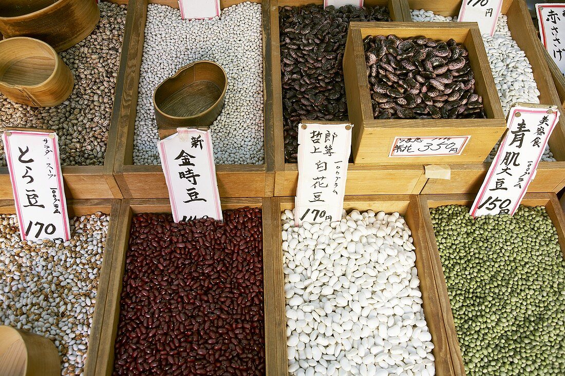 Various types of beans on a market stall in Japan