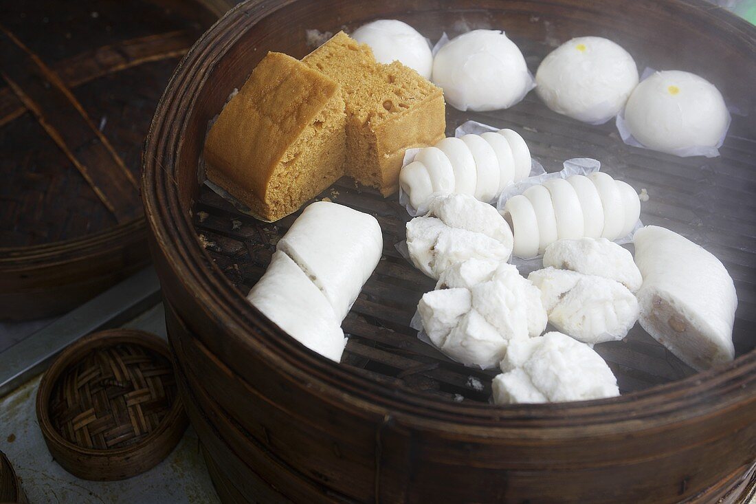 Various types of Chinese dumplings in steaming basket