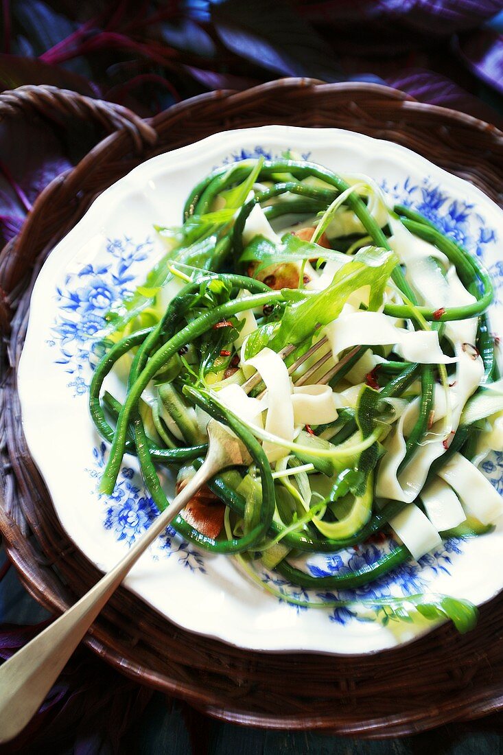 Ribbon pasta with asparagus beans and rocket