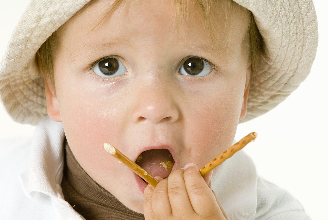 Small boy with broken salted stick