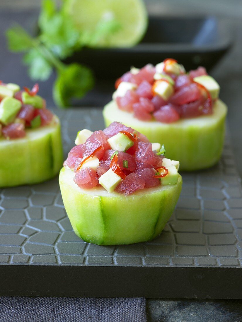 Cucumber towers topped with tuna tartare