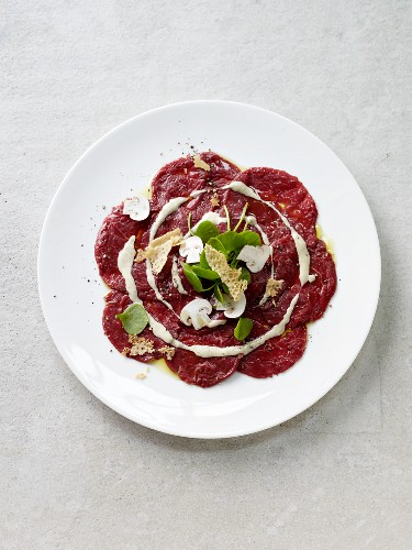 Beef carpaccio with porcini cream