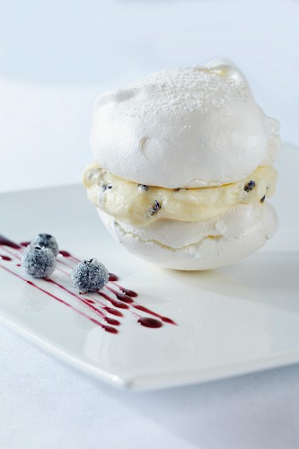 Lavender flower meringue with blueberries and vanilla filling