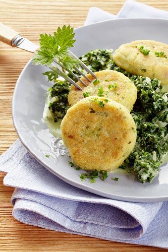 Potato cakes with stinging nettles and spinach