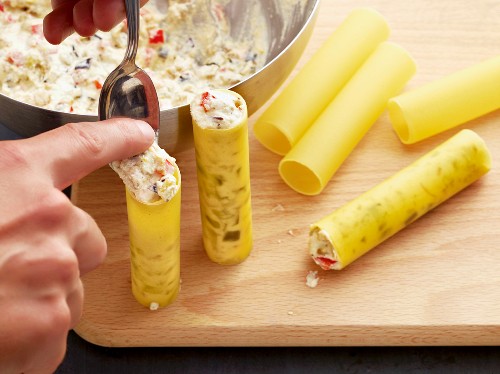 Aubergine cannelloni being made