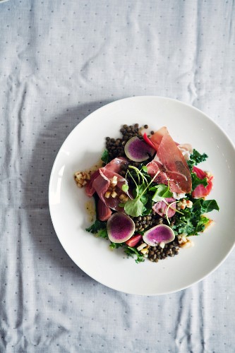 Lentil salad with vegetables and ham (seen from above)