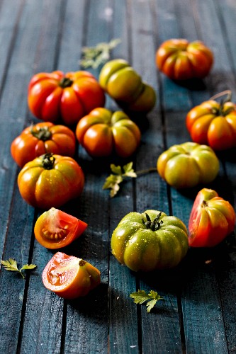 Tomatoes on a wooden surface