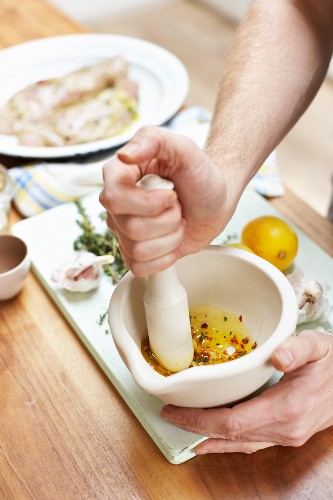 A marinade being made in a mortar