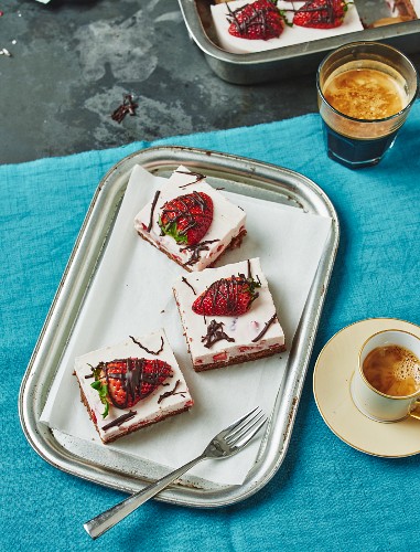 Strawberry cake slices served with coffee