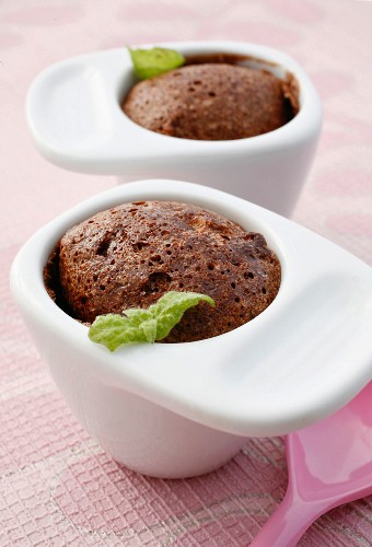 Warm chocolate and almond pudding in cups