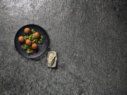 Fava bean falafel with garlic and cinnamon yoghurt (seen from above)