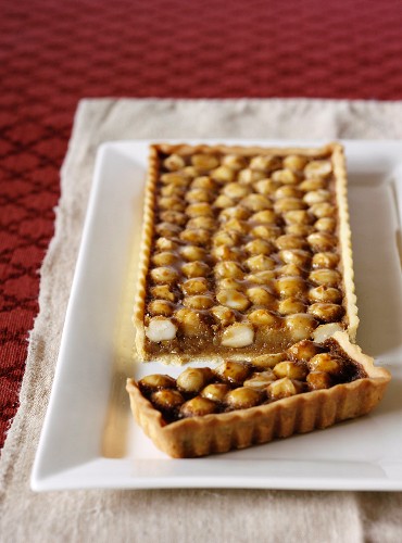 Macadamia nut tart with golden syrup