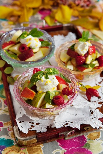 Fresh apple and raspberry salad with yoghurt and honey