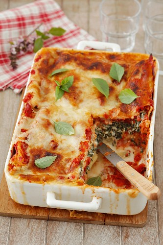 Cannelloni with spinach and ricotta in a tomato and Bechamel sauce