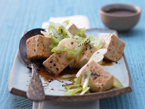 Steamed silk tofu with ginger and spring onions