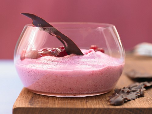 Lingonberry yoghurt espuma with almonds in chocolate