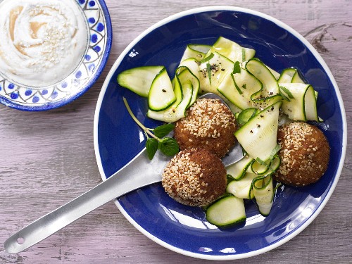 Falafel with a sesame yogurt dip and a courgette salad