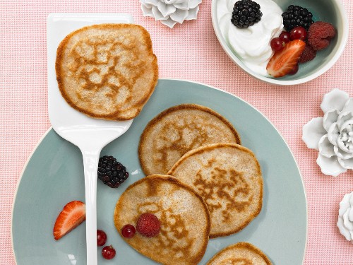 Whole grain buttermilk pancakes with quark cream and berries