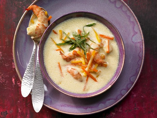 Ginger soup with prawns, carrots and pumpkin