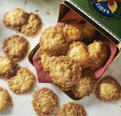 Cookies being tipped out of a tin