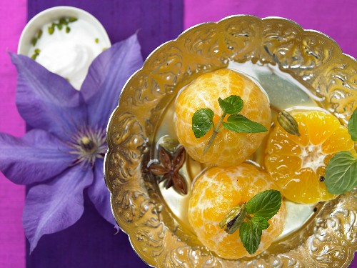 Poached clementines with cardamom, star anise and rose water